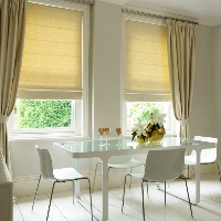 Luxurious Roman blinds create a soft atmosphere in any room